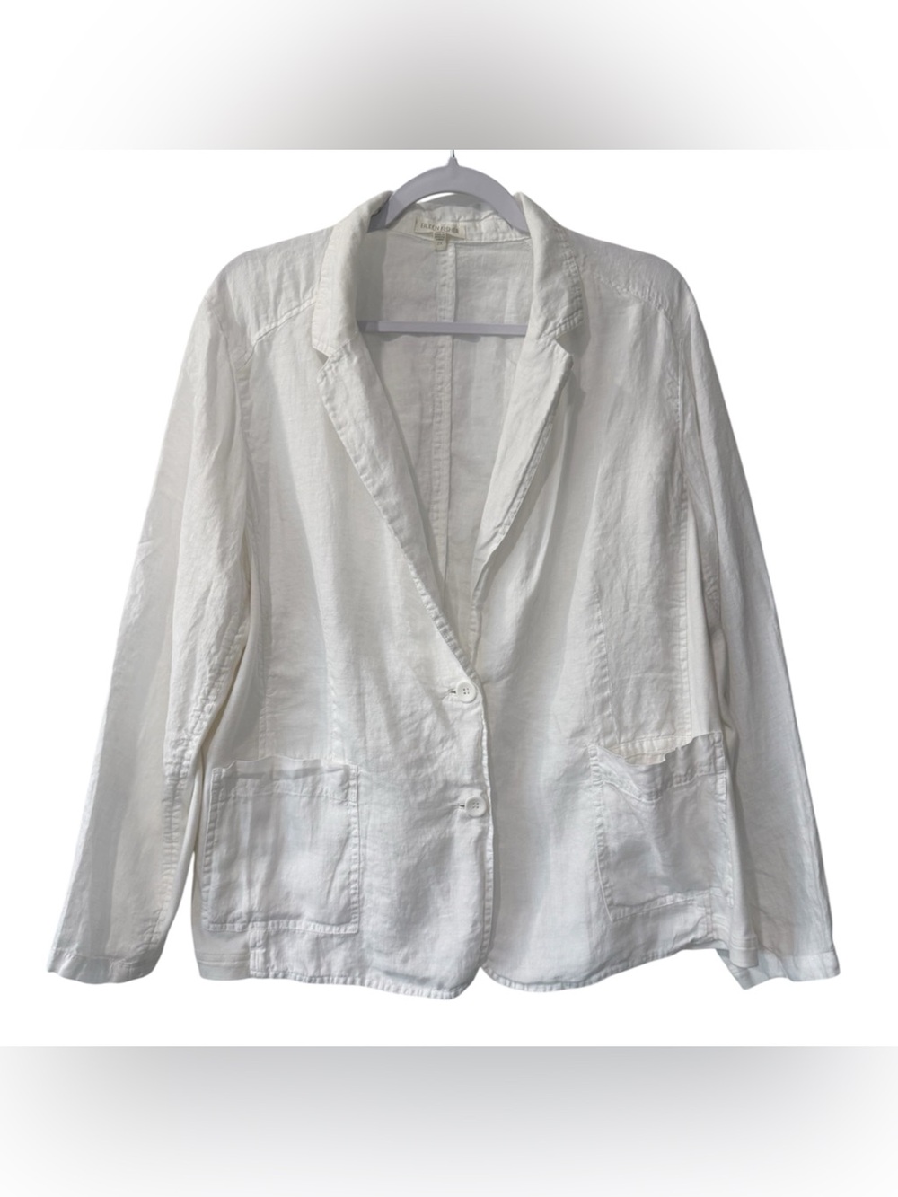 Eileen Fisher white Irish linen blazer with a two-button closure front pockets.